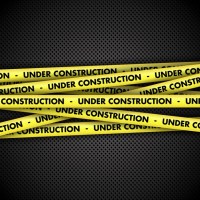under-construction-warning-tape-metal-background_1048-1373